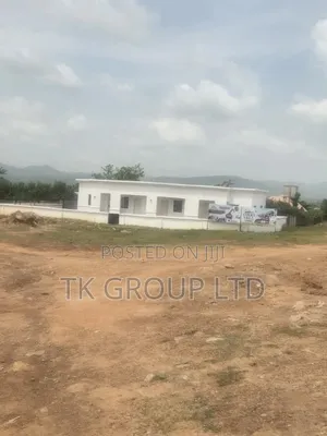 Kuje, FCDA; Court Villa Estate, First Plot on the Road. Tarred Road