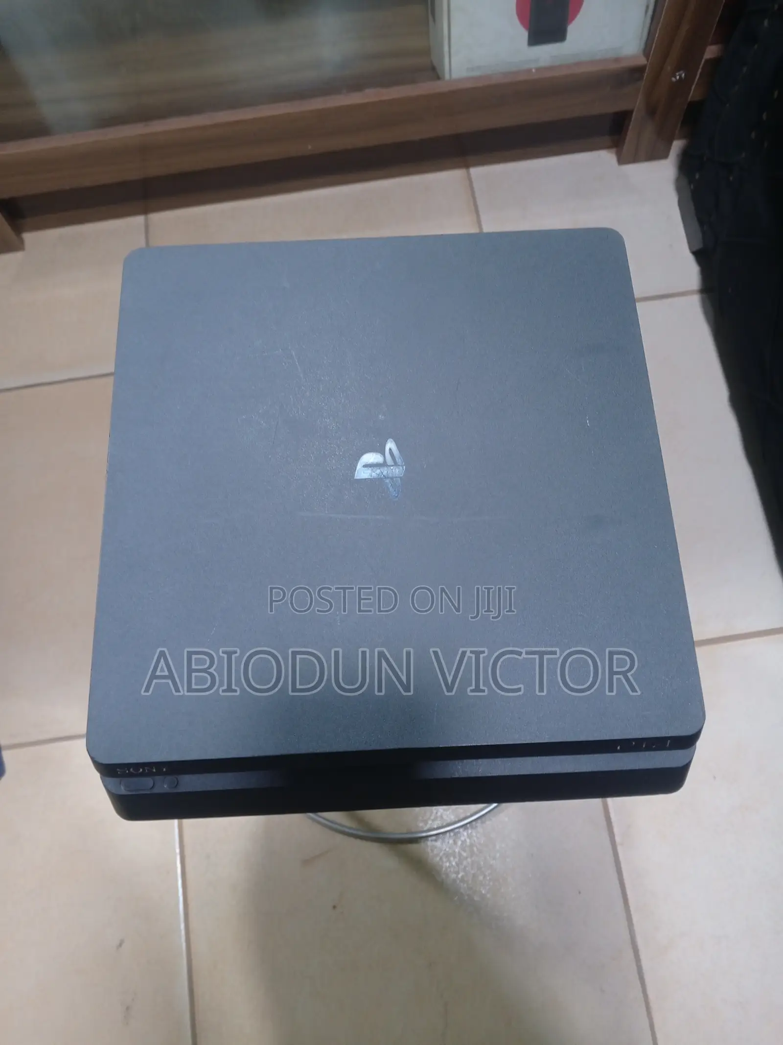PlayStation 4 Slim With Games and Two Controllers