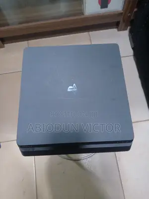 PlayStation 4 Slim With Games and Two Controllers