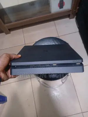PlayStation 4 Slim With Games and Two Controllers