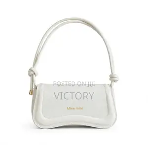 Miss Mini Knotted Baguette Bag