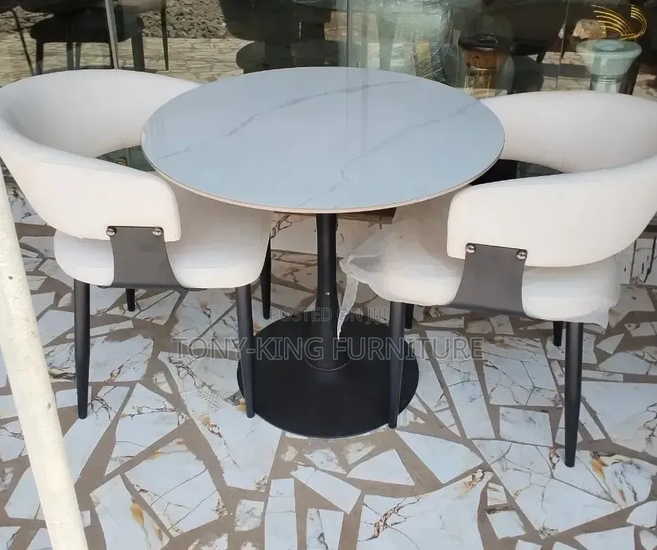 Modern Imported Mini Marble Dining Sets With Black Metal Base.