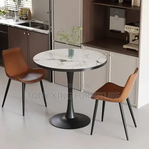 Round Kitchen and Dining Table Featuring a White Sintered Marble Top