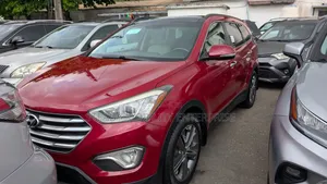 Hyundai Santa Fe Limited 4dr SUV AWD (3.3L 6cyl 6A) 2015 Red