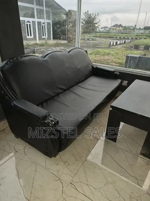 2 Strong & Neat Leather 3 Seaters With Center Table