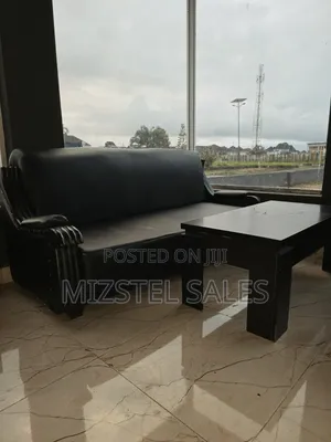 2 Strong & Neat Leather 3 Seaters With Center Table
