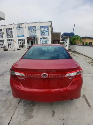 Toyota Camry SE 4dr Sedan w/Prod. End 11/13 (2.5L 4cyl 6A) 2014 Red