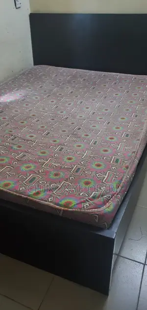 4 by 6 Black Solid Wooden Bed Frame and Mattress.