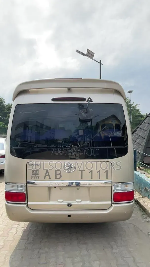 Toyota Coaster 2009 Gold
