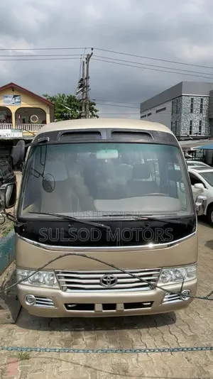 Toyota Coaster 2009 Gold