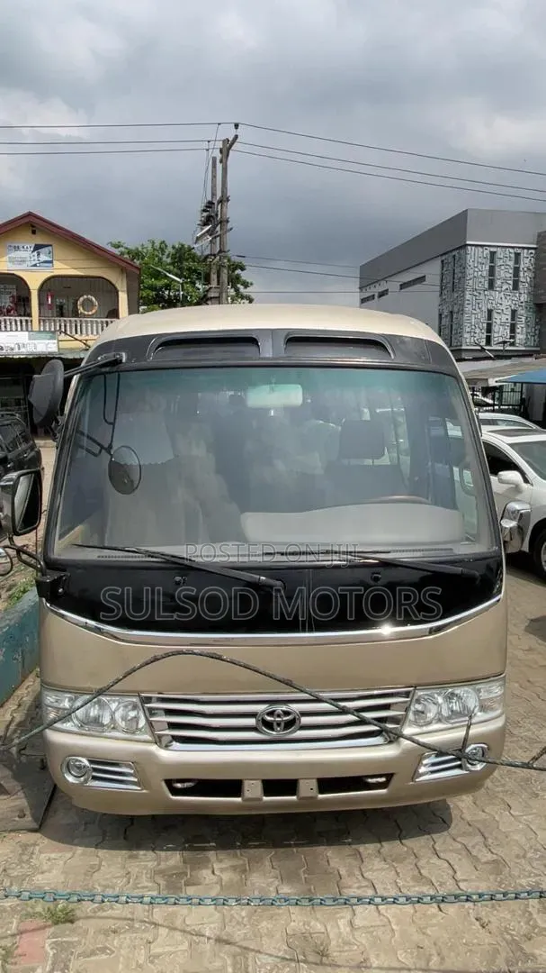 Toyota Coaster 2009 Gold
