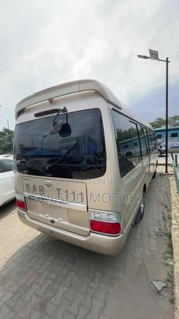 Toyota Coaster 2009 Gold