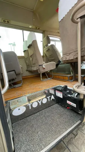 Toyota Coaster 2009 Gold