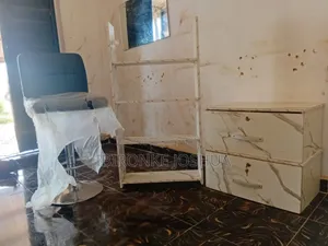 Shelves and Drawer and Barbing Chair
