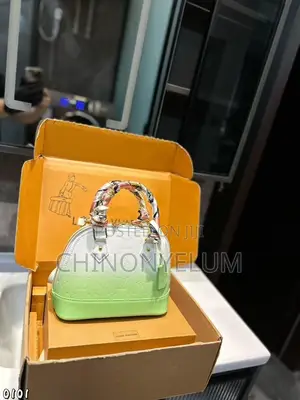 Luxury Embossed Leather Handbag With Top Handle and Detachable Strap