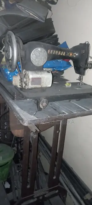 Sewing Machine (GENERAL)//Water Vacuum Cleaner (Bissell)