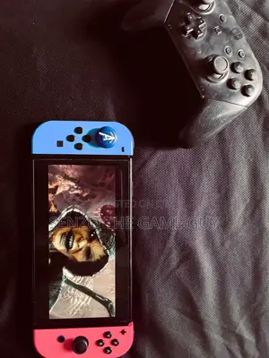 Nintendo Switch Oled - Affordable and With Two Free Cartridge