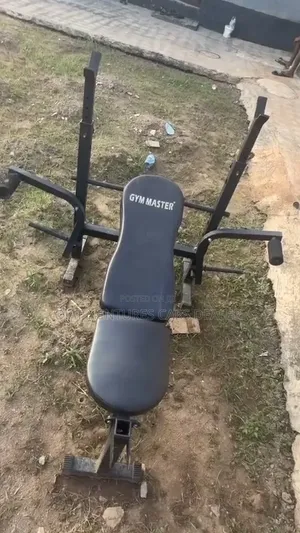 Adjustable Dumbbell & Barbell Set Weight Bench With an Attach Rack.