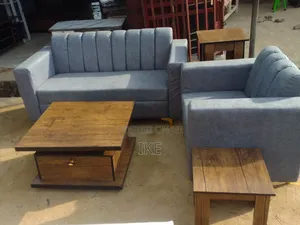 Double and a Single Sitter Chair With 2 Side Stool and a Center Table