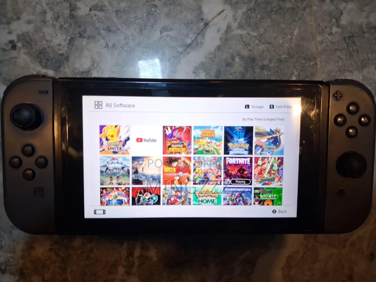 Nintendo Switch V2 + Original Carrying Case