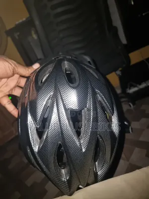 Cyclist Safety Helmet With Sun Visor