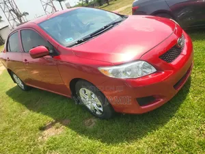 Toyota Corolla LE 4dr Sedan (1.8L 4cyl 4A) 2010 Red