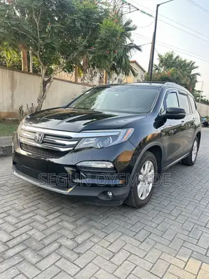 Honda Pilot Touring 4dr SUV 4WD (3.5L 6cyl 9A) 2016 Black