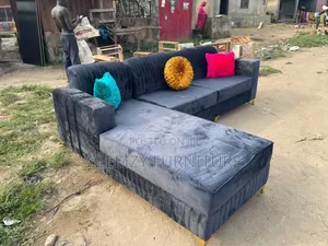 Gray Color L Shape Couch and Pillows