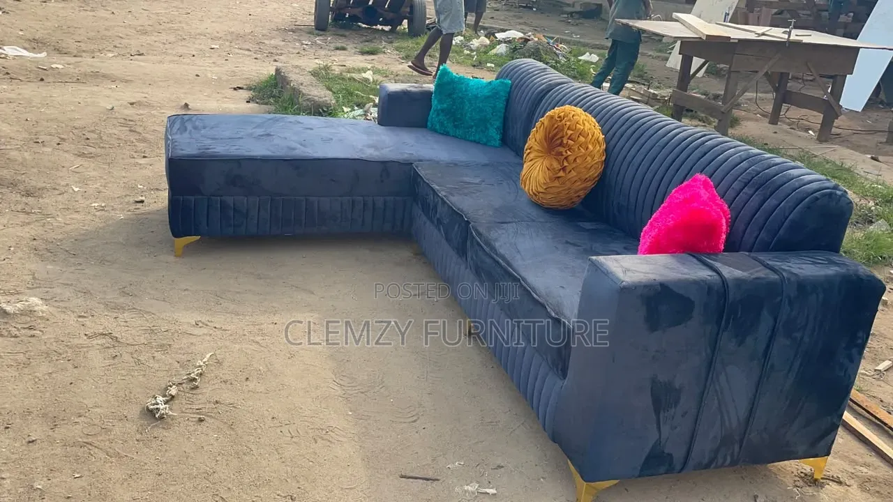 Gray Color L Shape Couch and Pillows