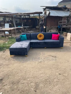 Gray Color L Shape Couch and Pillows
