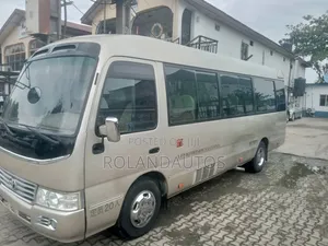 Toyota Coaster 2009 Gold