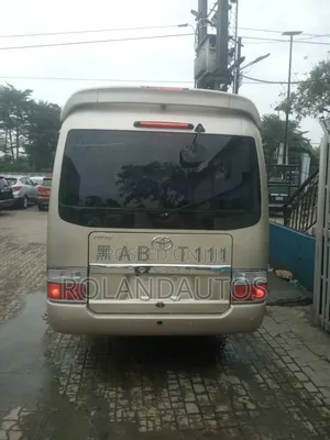 Toyota Coaster 2009 Gold