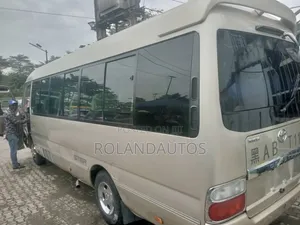 Toyota Coaster 2009 Gold