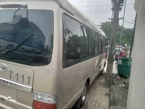 Toyota Coaster 2009 Gold
