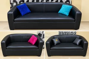 Black Leather Two-Seater Sofa – Fairly Used, Negotiable