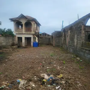 Land With Uncompleted Building Fence Gate