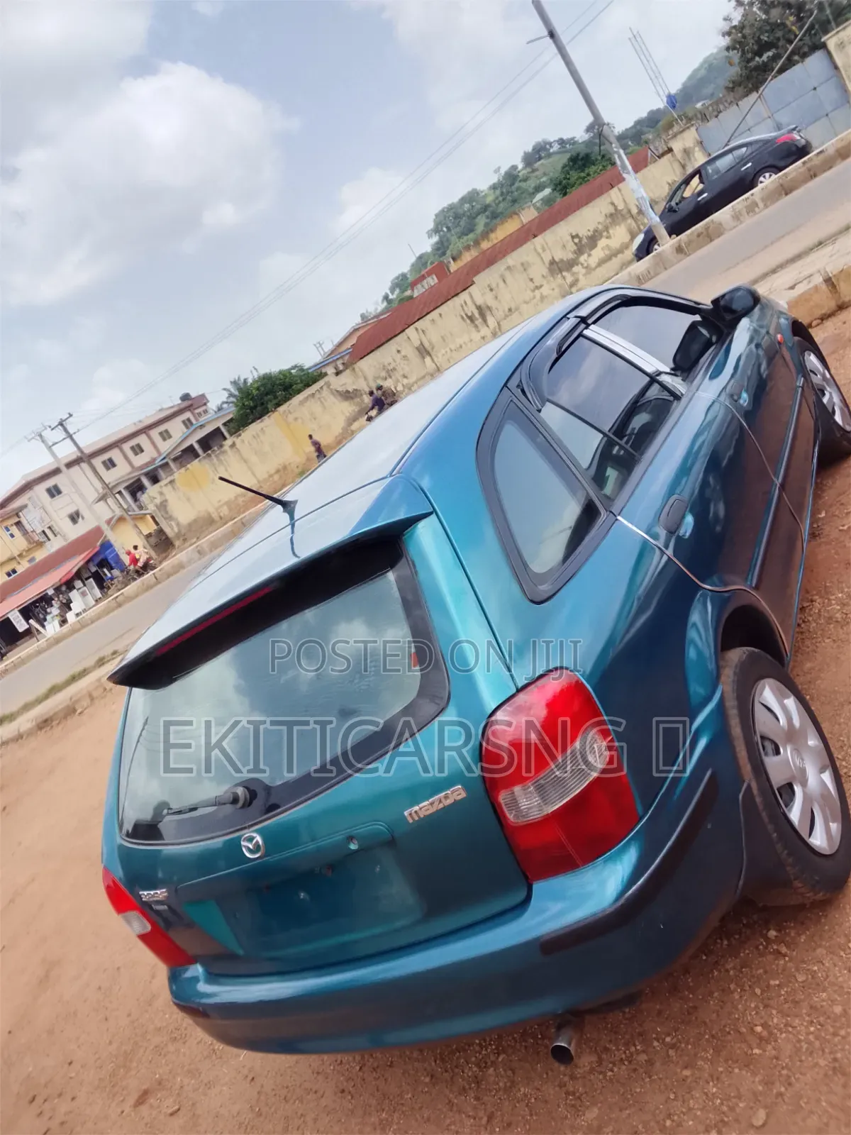 Mazda 323 2004 Green