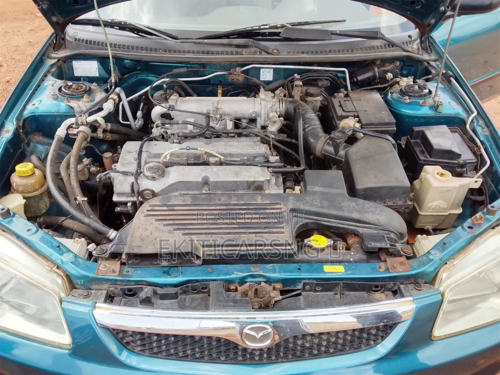 Mazda 323 2004 Green