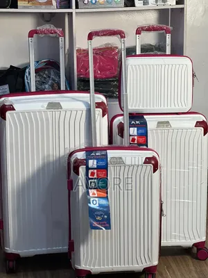 White and Pink Rubber Luggage
