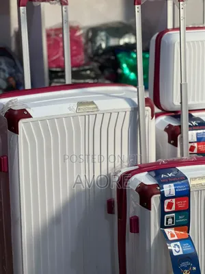 White and Pink Rubber Luggage