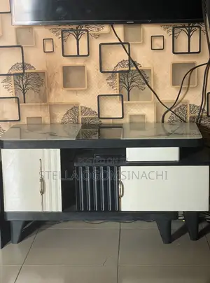 Foreign Adjustable TV Stand With Storage Cabinets.