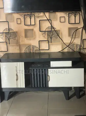 Foreign Adjustable TV Stand With Storage Cabinets.