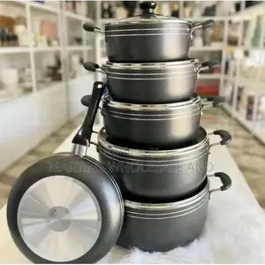 Non-Stick Cookware Set Featuring a Stack of 5 Cooking Pots and 1 Match