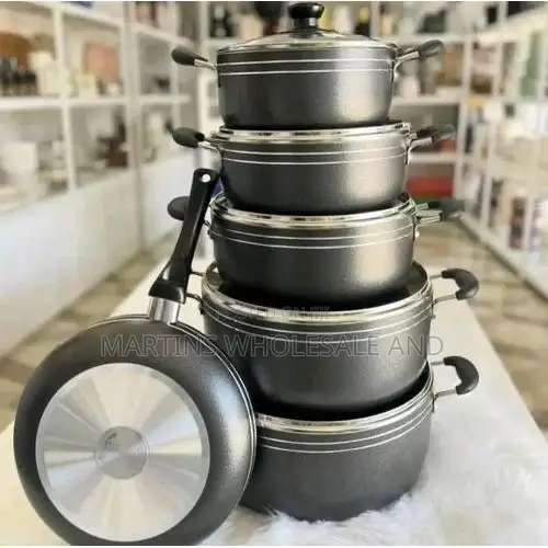 Non-Stick Cookware Set Featuring a Stack of 5 Cooking Pots and 1 Match