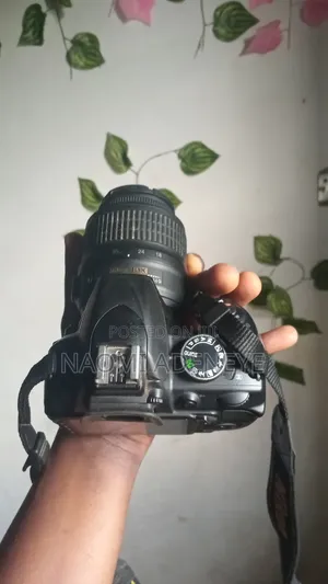 Nikon D3100 DSLR Camera With Lens, Battery,Charger, and Memory Card