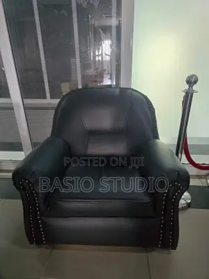Neatly Used Black Leather Single Seater Sofa