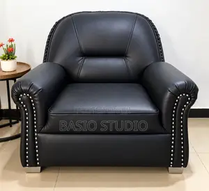 Neatly Used Black Leather Single Seater Sofa