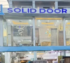 A Solid HDF Flush Door With Black Chrome