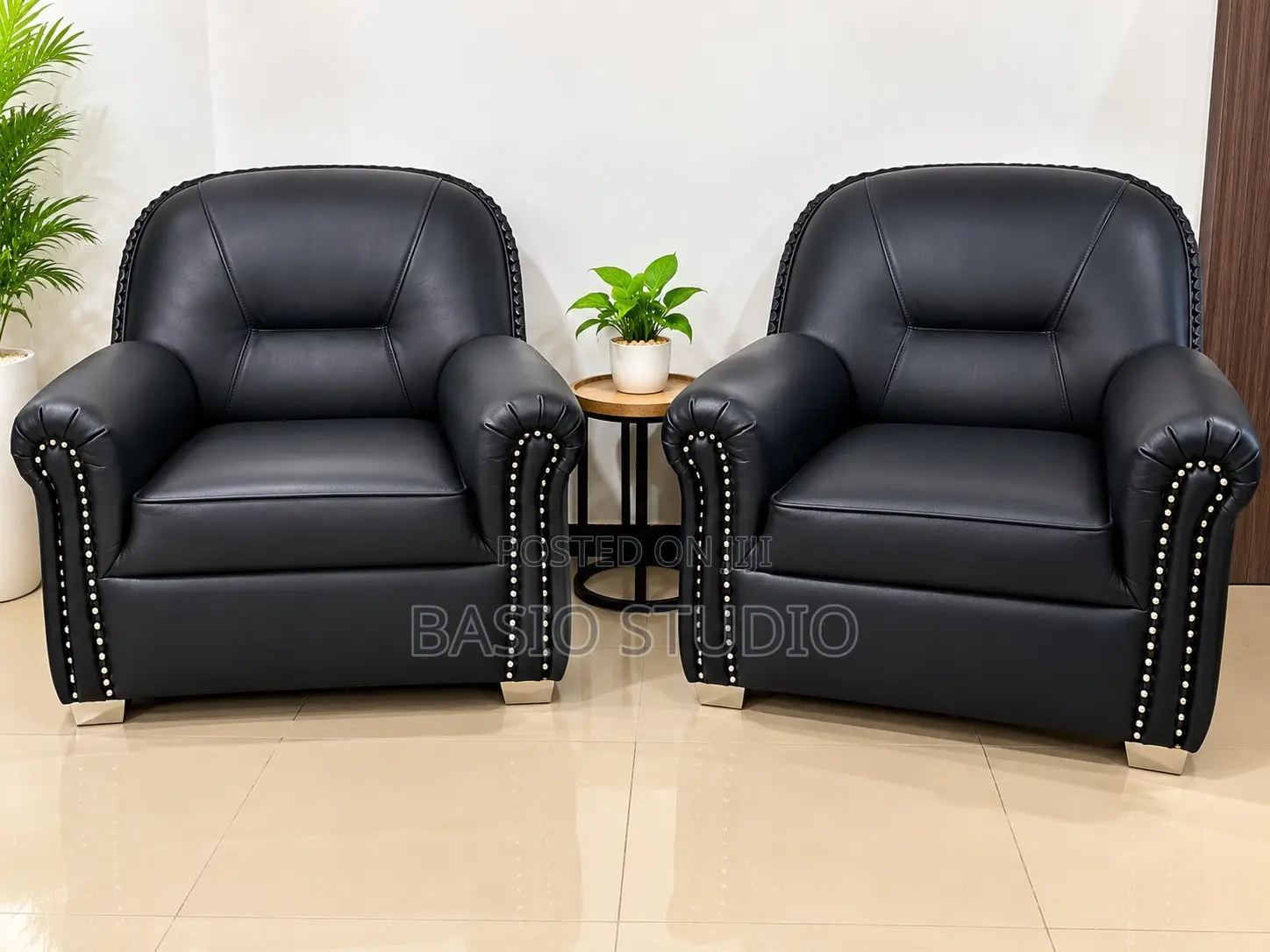 Set of 4 Black Leather Sofas (3 Single Seaters + 1 Three Seater)