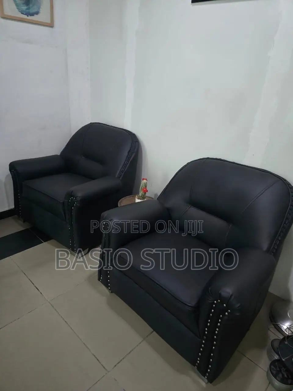 Set of 4 Black Leather Sofas (3 Single Seaters + 1 Three Seater)